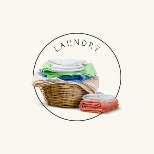 laundry towels in basket with beige background